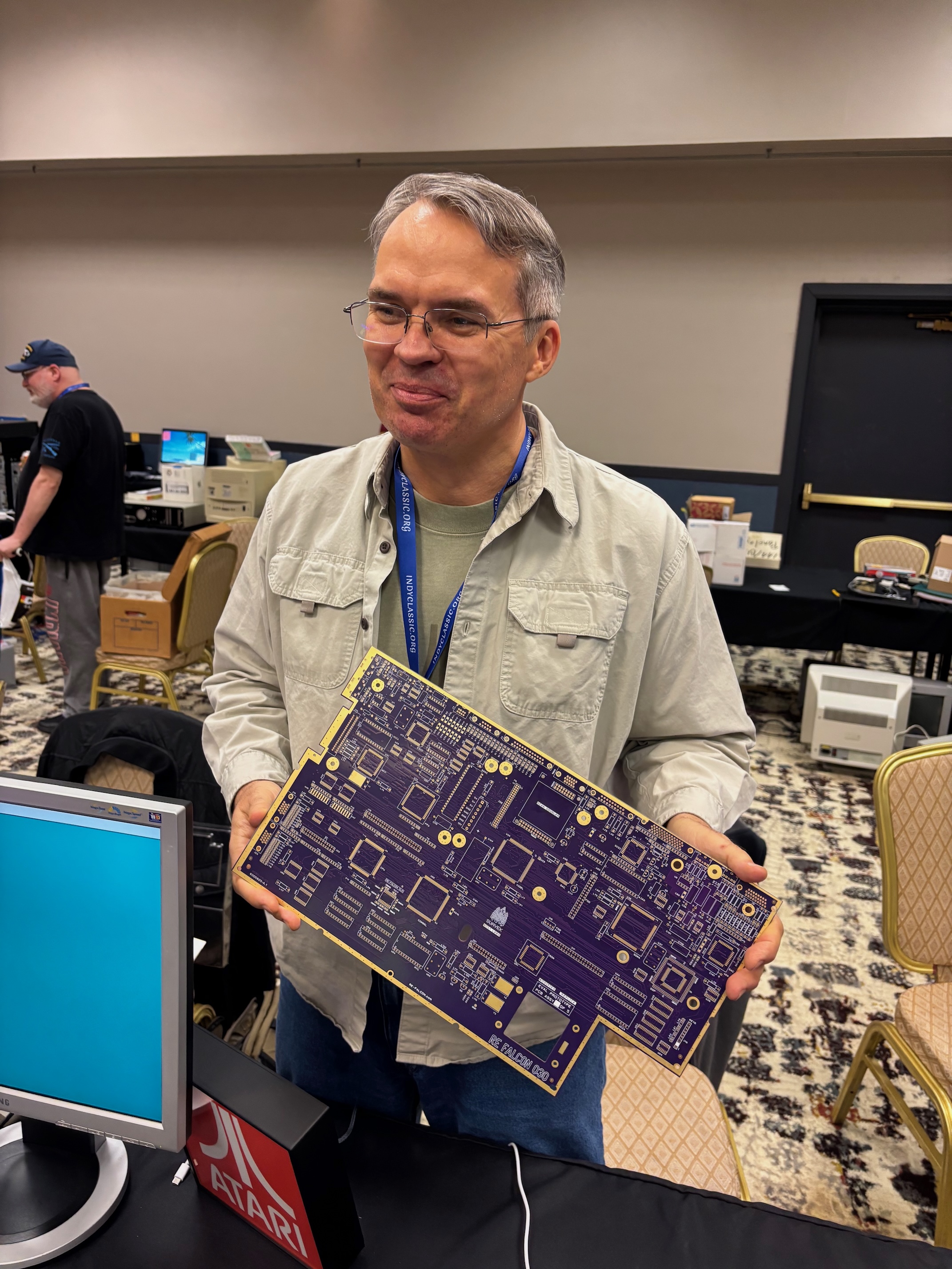 Steve Suavek holding the bare Re-Falcon purple PCB